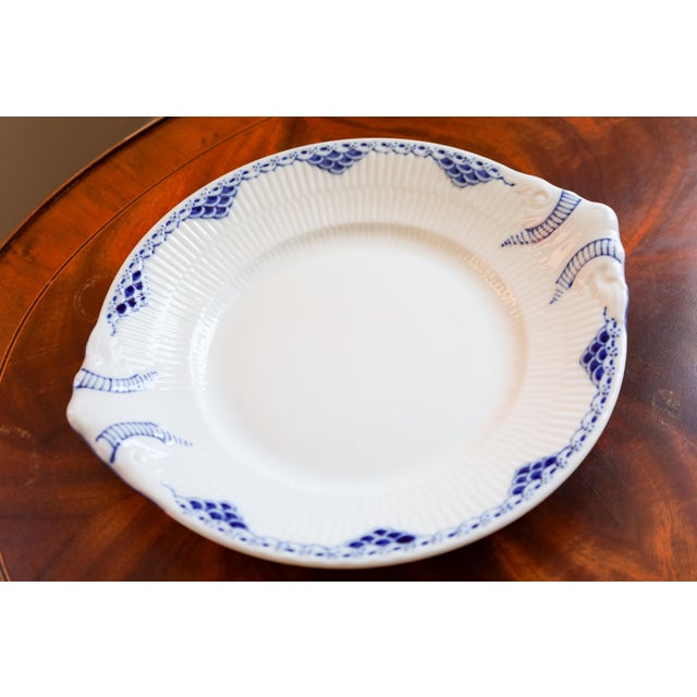 A spectacular, heirloom-quality vintage round handled platter/cake dish by Royal Copenhagen in the iconic "Princess"...