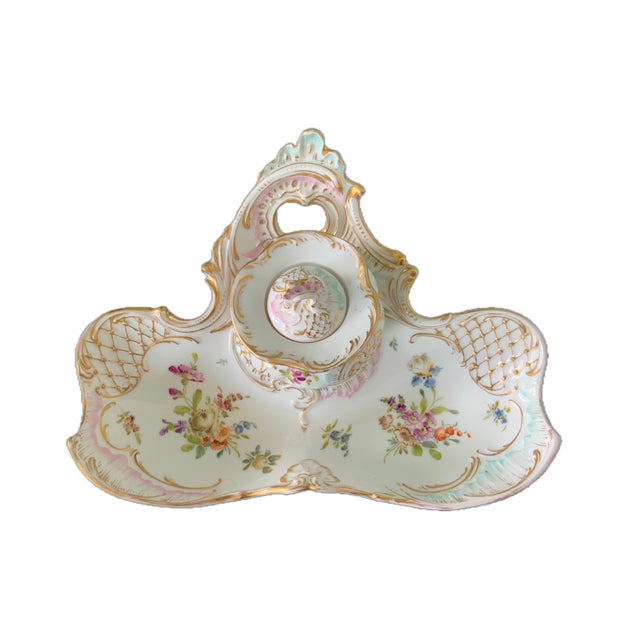 Beautiful example of Dresden porcelain, known for its intricate hand-painted fkirak designs. These pieces are highly...