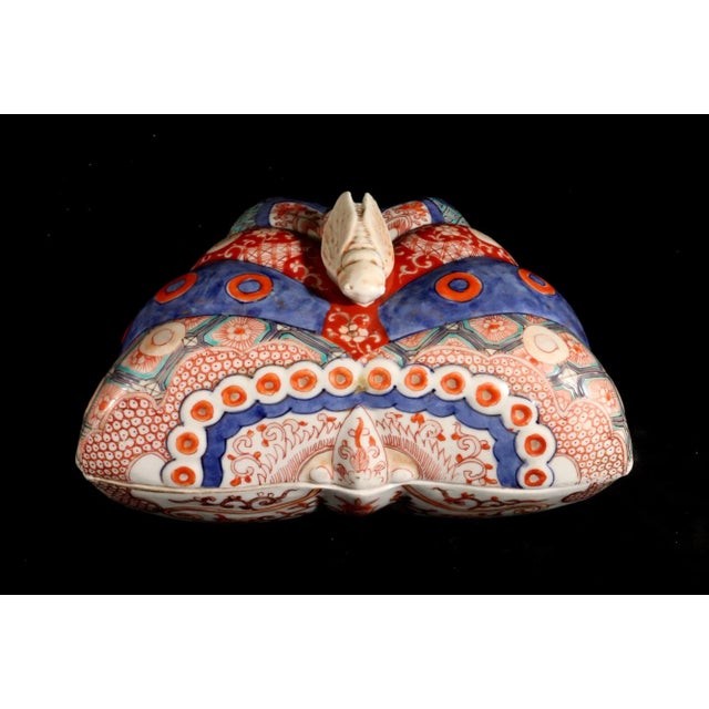 Japanese Imari Porcelain Box in the form of a Butterfly, Mid-19th Century, The Japanese porcelain Imari box is molded in...