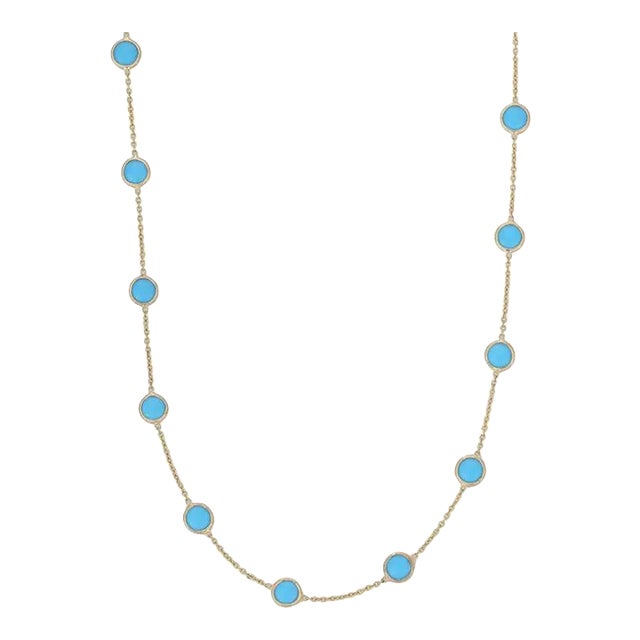 Turquoise Necklace in 18K Gold studded with round cut turquoise gemstone. Accessorize your look with this elegant...