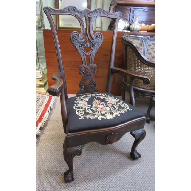 This is a wonderful Parlor Size Mahogany Chippendale Style Library Arm chair. It is made of solid mahogany and has a very...