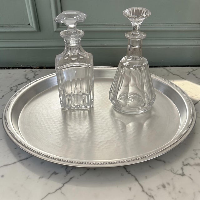 Vintage Italian silverplate serving tray by Calegaro, Italy. This elegant round tray features a hand-hammered center...