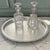 Vintage Italian silverplate serving tray by Calegaro, Italy. This elegant round tray features a hand-hammered center...