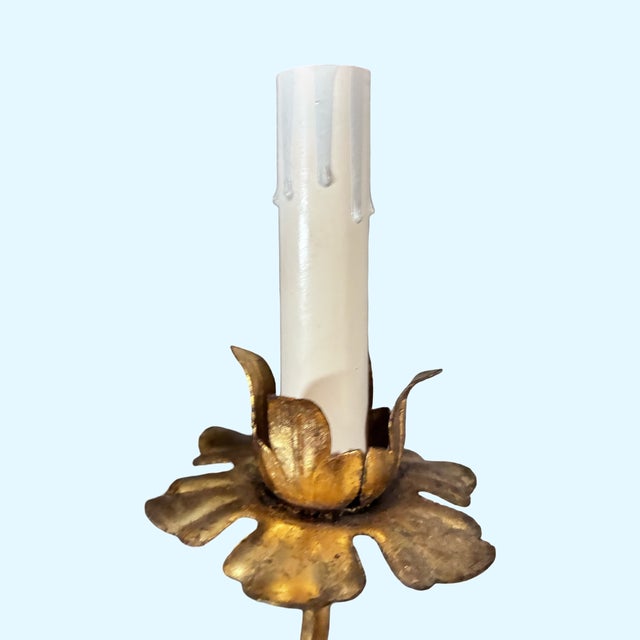 Intricate brass wall sconce with porcelain roses, circa 1860. Sculpted in the Italian Tole style. Unknown maker/manufacturer.