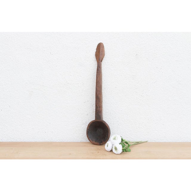 There is something deeply soulful about a simple wooden spoon—especially one carved by hand to feed a village. This...