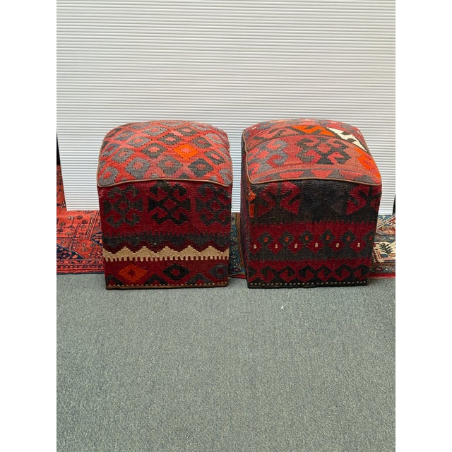 Design Plus Gallery presents a Set of Two Kilim Hassock Footstools. There are low, upholstered pieces of furniture covered...