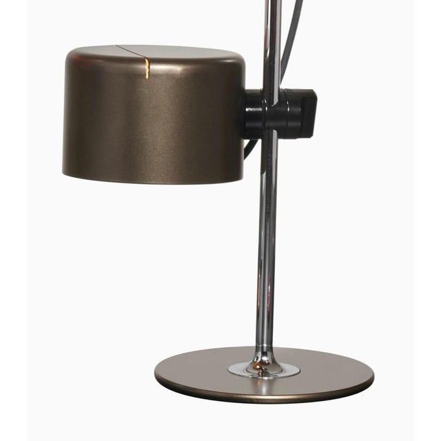 Set of two table lamps model mini coupe designed by joe colombo. Table lamp giving direct light, lacquered metal base,...