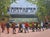 And Another Hundred People Getting Off of the Train by Chicago Artist George T. Chakos For Sale
