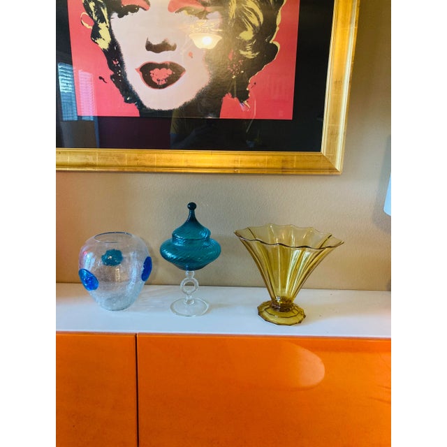 Fabulous vintage Art Deco center piece footed bowl. The color is amber stands 10” tall.