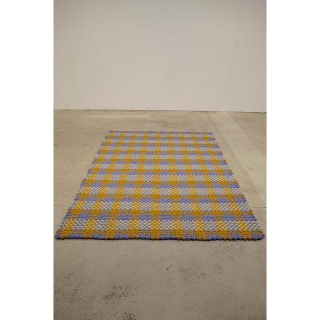 Knitted Wool Mylla rug by Lisa Darland Dimensions: W 166 x H 243 cm. Materials: Wool. In Sweden, over a thousand tons of...