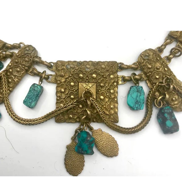 An exquisite mid-Victorian bookchain festoon necklace, dating to approximately 1850–1880, distinguished by its elaborate...