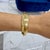 Ladies Roberto Coin 18k Yellow Gold Hammered Ruby Hinged Bangle Bracelet For Sale - Image 9 of 9