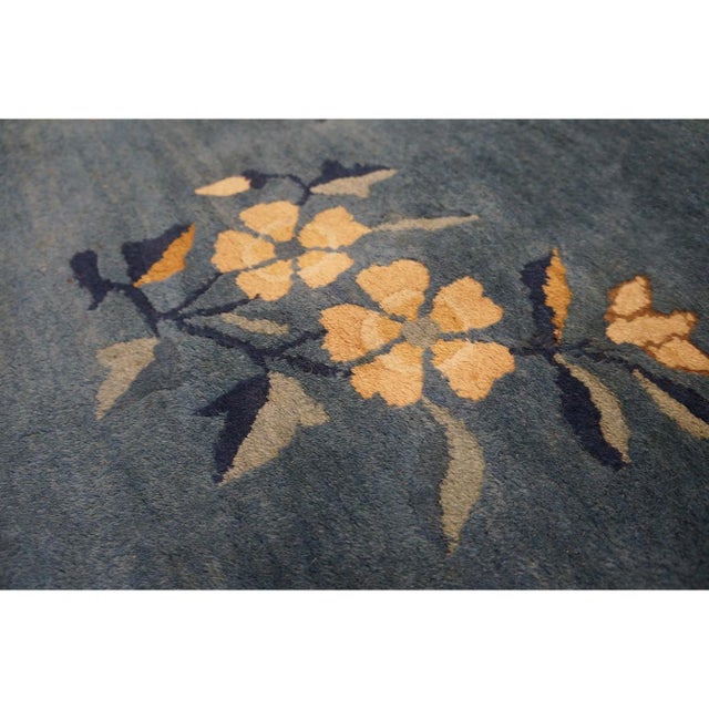 Antique Chinese Chinese Floral, Medallion Knotted Rug, Circa Date: 1920s. This stunning piece is an exemplary...