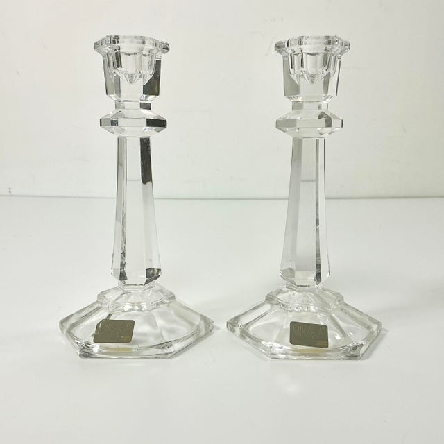 Two traditional cut crystal Candlestick Holders from Mikasa. They feature a 6-sided base, a cut pedestal stem and...