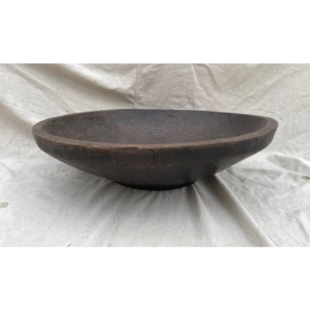 Antique Large 23.25in round Primitive Wood Turned Bowl. The wood shows beautiful wood grains and a beautiful patina due to...