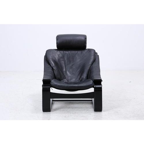 Vintage leather armchair by Åke Fribytter for Nelo from the 1970s with a striking, cantilevered shape and clean...