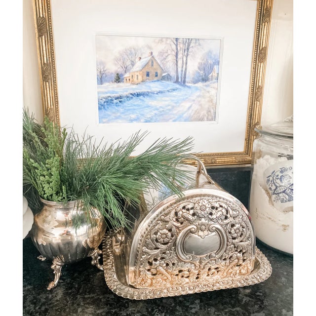 A truly exceptional Victorian English silver-plated cheese dome with its original matching serving tray, dating to...