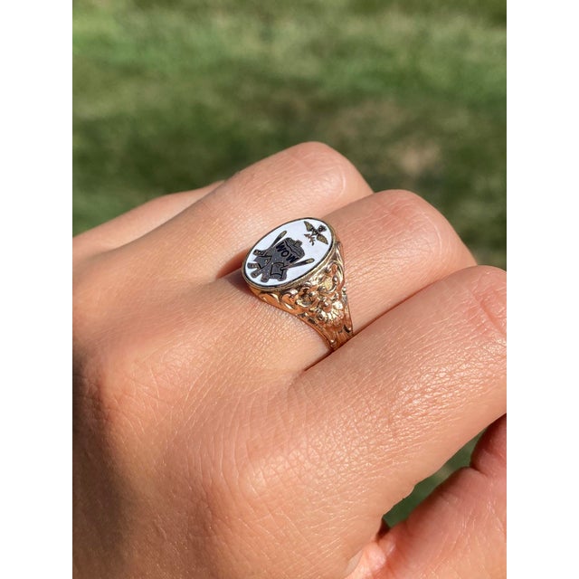 The Lanvale: Men's 14K Rose Gold Enameled Ring. Crafted in 14 karat rose gold, this ring features original white enamel...