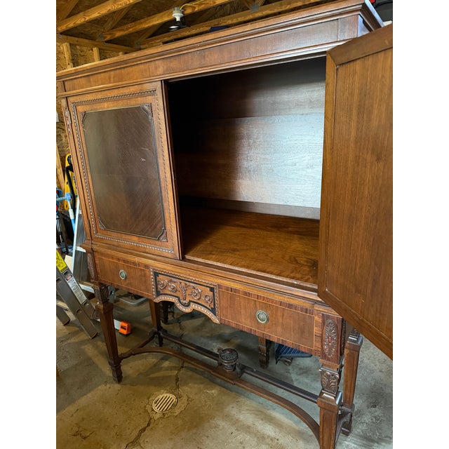 Victorian era China Hutch. I have not noticed any major damage on the piece. The shelves are intact and work, they are...