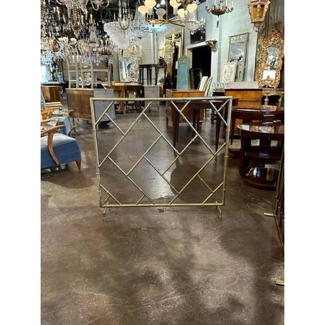 Custom made by Legacy stylish bamboo form brass firescreen. Add a very stylish touch! Note: Custom sizes and designs are...