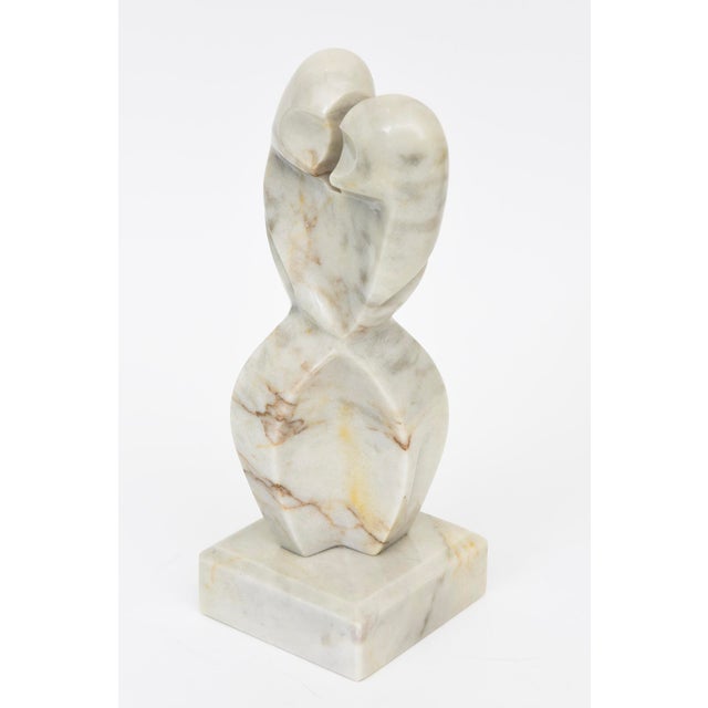 This wonderful vintage 1970's cubist abstract marble sculpture are figures intertwined. The marble is variegated even with...