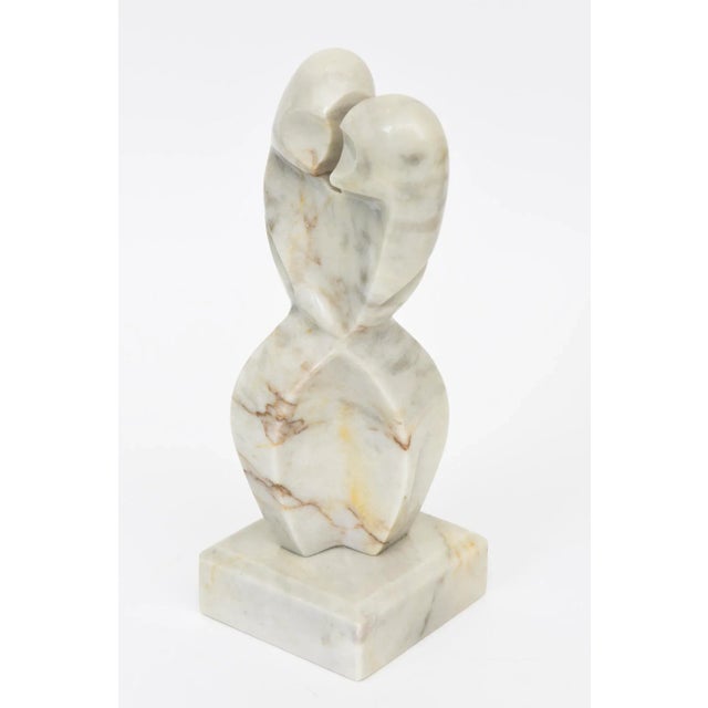 This wonderful vintage 1970's cubist abstract marble sculpture are figures intertwined. The marble is variegated even with...