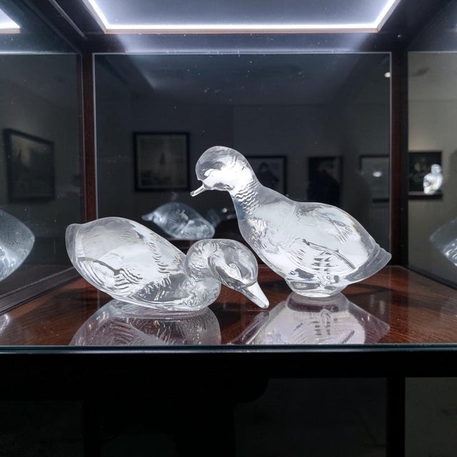 An authentic Baccarat full lead crystal pair of duck figurine, crafted in France during the late 20th century. This...