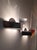 A fan-shaped wall sconce from Oggetti's Prisma collection, designed by Muranese lighting master Carlo Nason. A faceted...