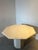 Elegant vintage dining table crafted in beautiful natural travertine stone. The table features a striking octagonal top...