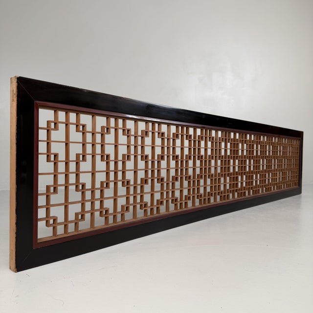 This elegant Japanese ranma is built around traditional kumiko woodworking: a refined open lattice of precisely fitted...