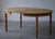 Mid century Danish round dining table in solid oak with two extensions, made in 1960s. Curved legs, great craftmanship in...