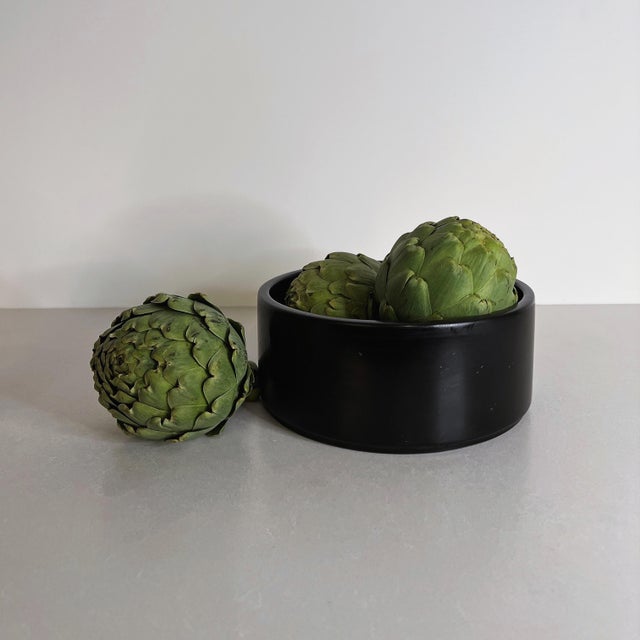 Handcrafted from richly toned black marble, the Joie Fruit Bowl is defined by its clean circular silhouette, substantial...