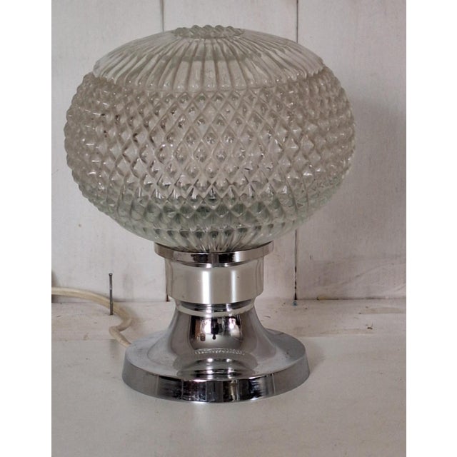 Vintage Table Lamp with Chrome-Plated Metal Base and Clear Relief Glass Shade by Ets, 1970s, in Very Good conditions....