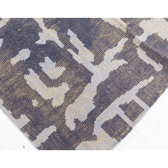 Contemporary Abstract Blue Purple Flat Weave Rug Size: 5'7" × 7'1" (170 × 215 cm) A contemporary flat-weave wool rug with...