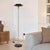 Contemporary Torchiere Floor Lamp - Rancho Mirage, Matte Black & Gold-Leaf Shade, Weathered Brass, Black Marble Base, Dimmer For Sale - Image 3 of 12