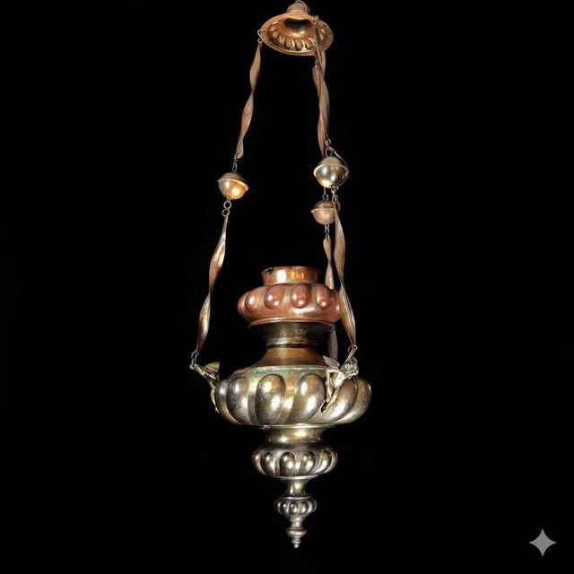 Embossed copper votive lamp made with a brass top. Three anthropomorphic brass castings (one of which is broken) attach to...