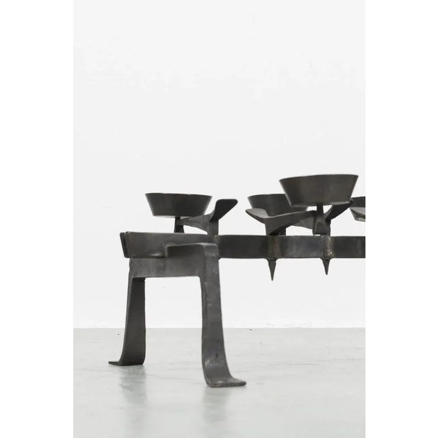 Robust heavy Brutalistic candle holder which deserves a prominent place in an interior. In a good vintage condition....