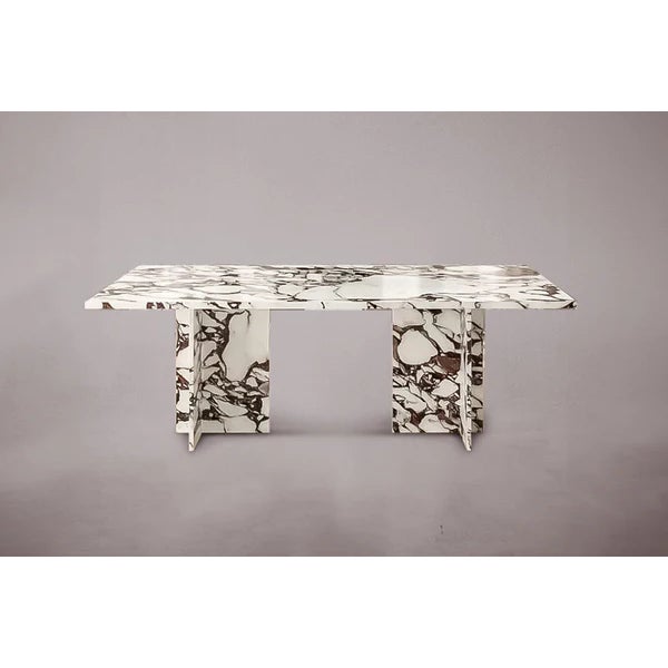 Elevate your dining experience with our exquisite rectangular T-legged dining table, crafted from luxurious Calacatta...