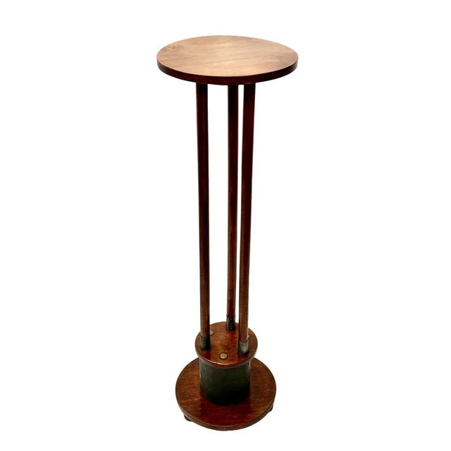 Typical of Viennese Secession furniture around 1900–1910, this piece reflects the shift from organic Art Nouveau toward a...