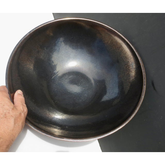 Ebony Metallic Glaze on a deep salad bowl or center bowl. Very modern taste in austere style. A rich color and bright...