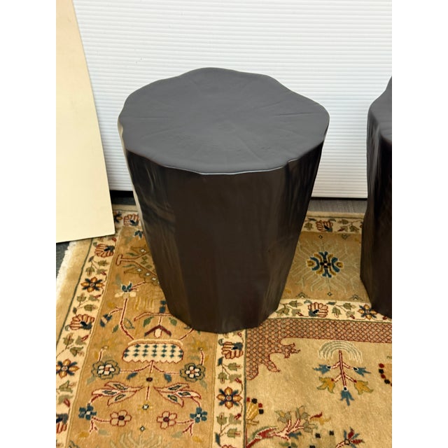 Design Plus Gallery presents a Pair of Black Ceramic Trunk Stools from Global Views. The stools are suitable for both...