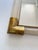 Rectangular “Torciglione” Murano Glass Wall Mirror with gold leaf inside. Scenographic wall mirror in unlaquered brass...
