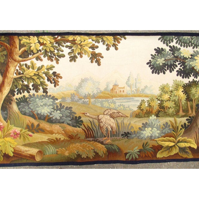 A truly beautiful and decorative Aubusson tapestry, exquisitely woven with a charming ibis bird set within a romantic...