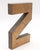 Vintage block style letter Z made of brass with a brushed finish. The piece has a hollow back. Good condition with surface...