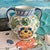 Bring a piece of Italy into your home with this exquisite hand painted ceramic amphora jug. Elegantly designed with a...