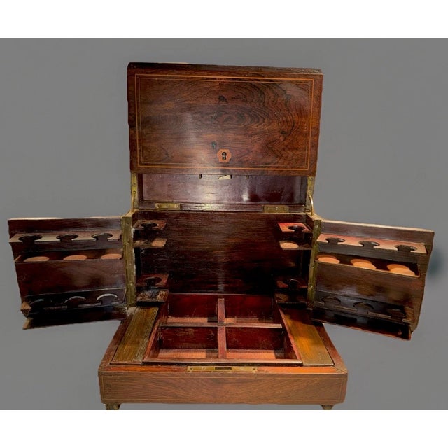This listing is for an antique tantalus liquor box/cabinet. This piece dates to the early 19th century and was made in the...