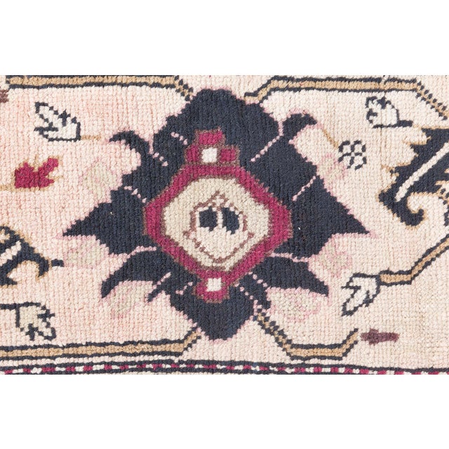 Strikingly elegant and steeped in the artistic legacy of the Caucasus, this antique Russian Karabagh rug (size adjusted)...