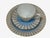 This 3-piece set by Rosenthal Germany includes a tea cup, saucer, and small plate, all featuring a wide pale blue band...