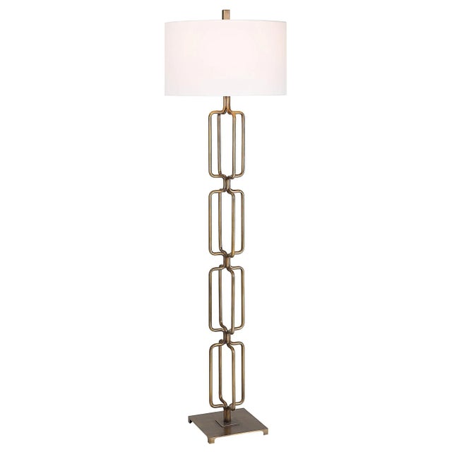 The Link Floor Lamp Features A Unique Design Made From Hand Forged Iron, Finished In A Heavily Antique Brushed Gold. The...
