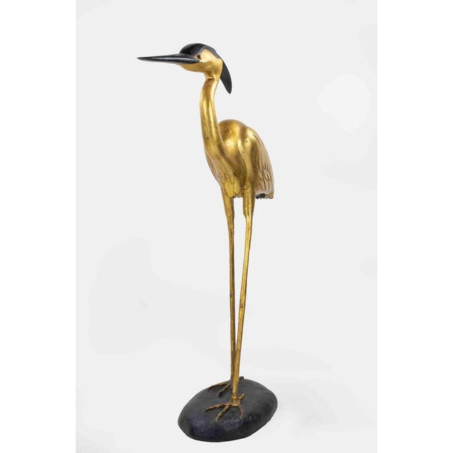 Vintage Life Size Heron in gilded and lacquered fiberglass. Hollywood Regency style. Glass eyes. In excellent condition,...